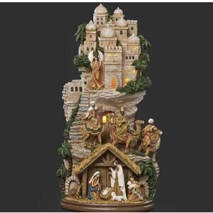 ROMAN Lighted Nativity Scene with Hillside and Palm Detail 2025 17” H X 6.5”W